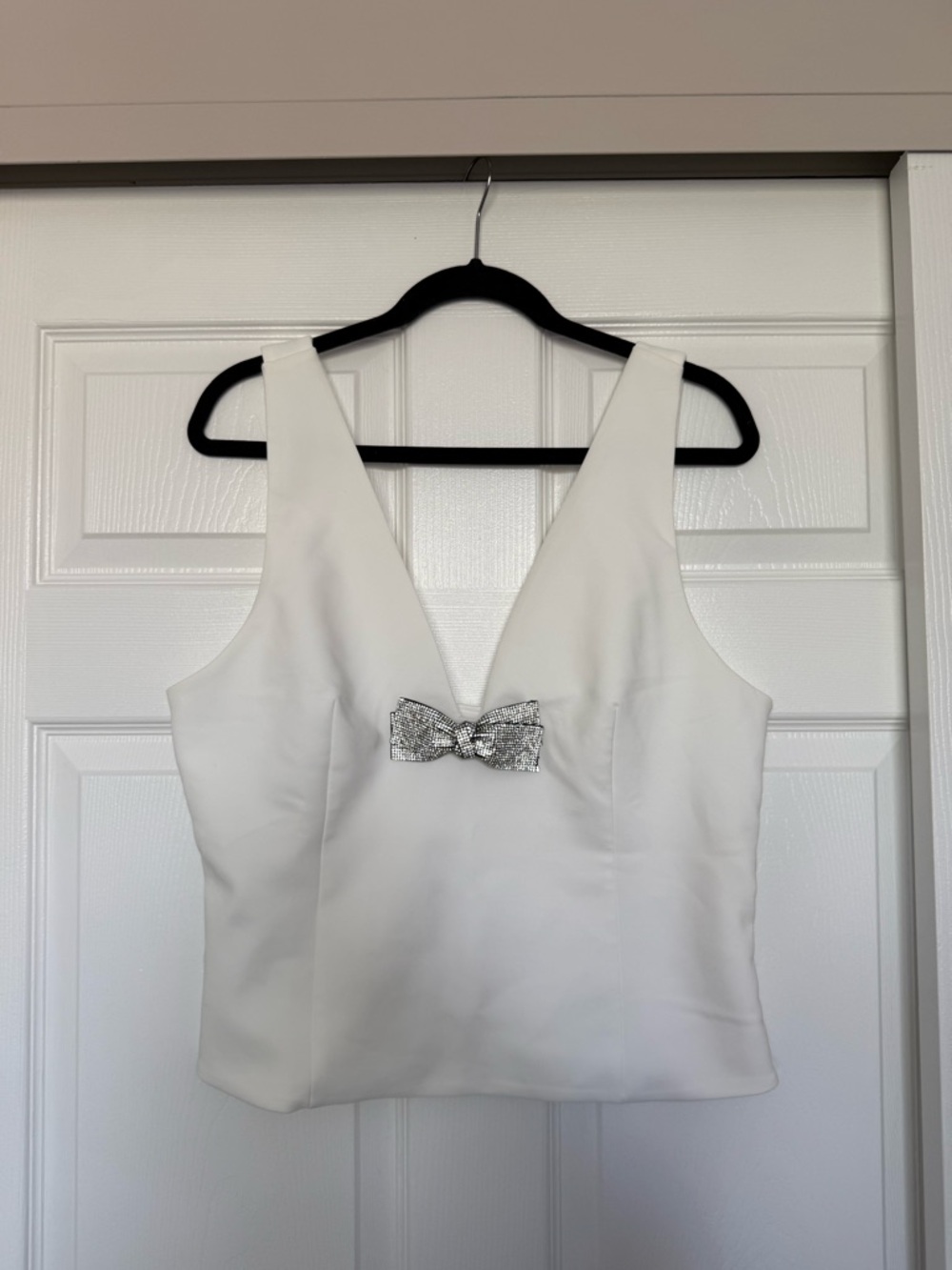 Zara White V-Neck Camisole with Silver Bow Accent